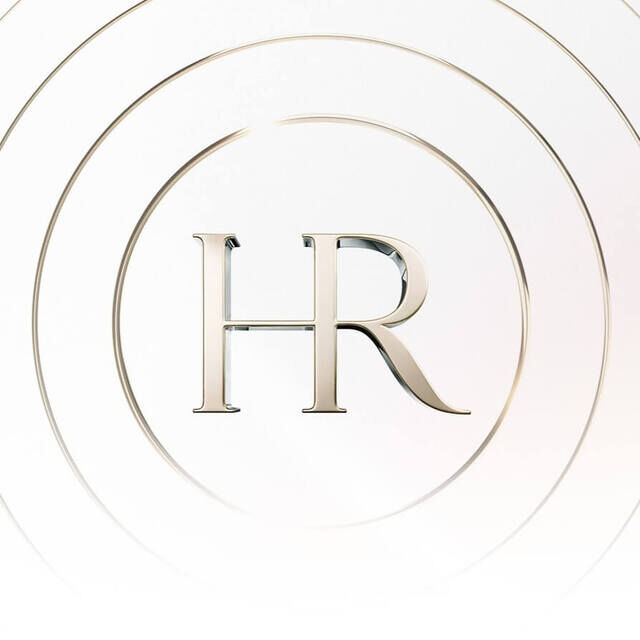 Le logo stylise "HR" en dore est centre dans un cercle, entoure de cercles concentriques sur un fond blanc et lumineux, symbolisant l'elegance et la purete.