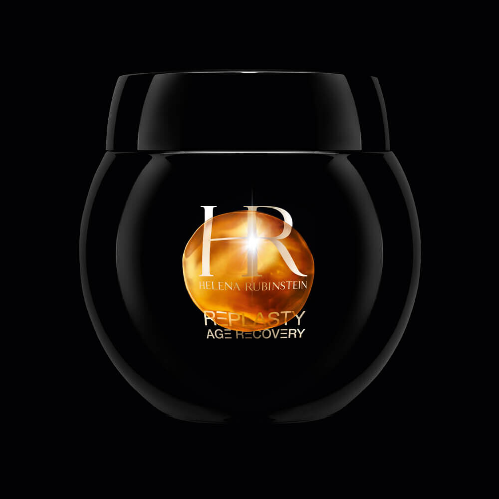 Pot de creme anti-age reparatrice Replasty d'Helena Rubinstein, elegant et dore, sur fond noir.
